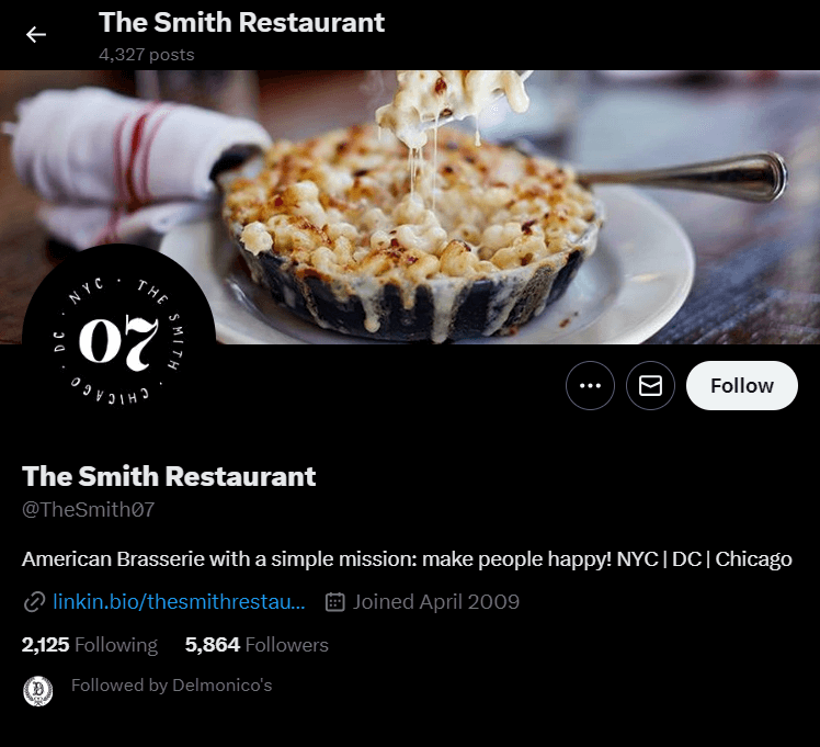 A Twitter profile for The Smith Restaurant featuring a close-up of a cheesy dish