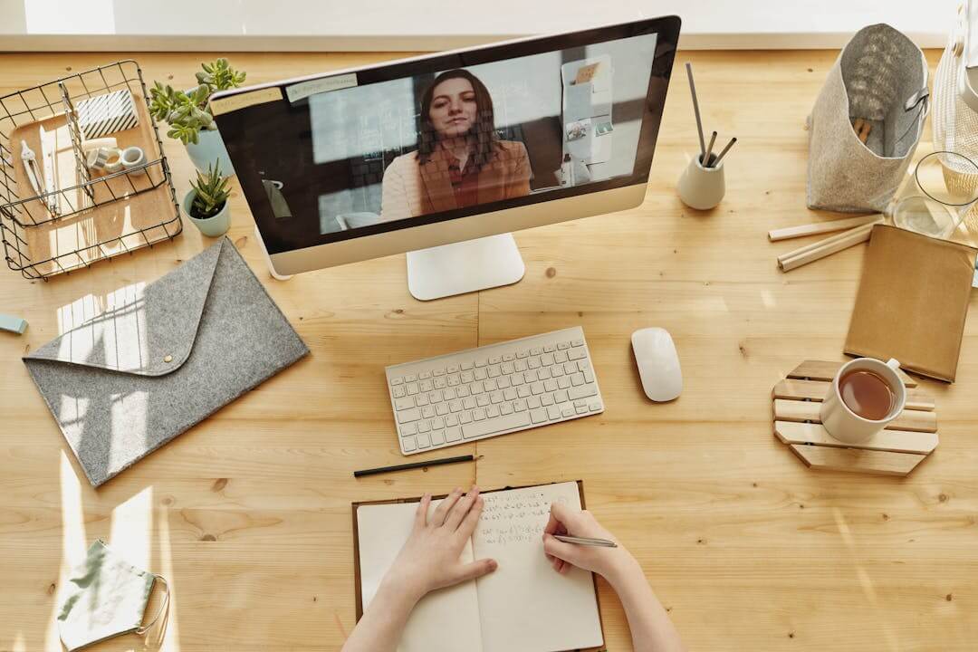 computer screen showing an educator indicating corporate learning as a part of digital marketing trends