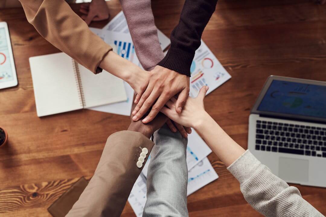 collection of hands indicating long term success as a POS reseller